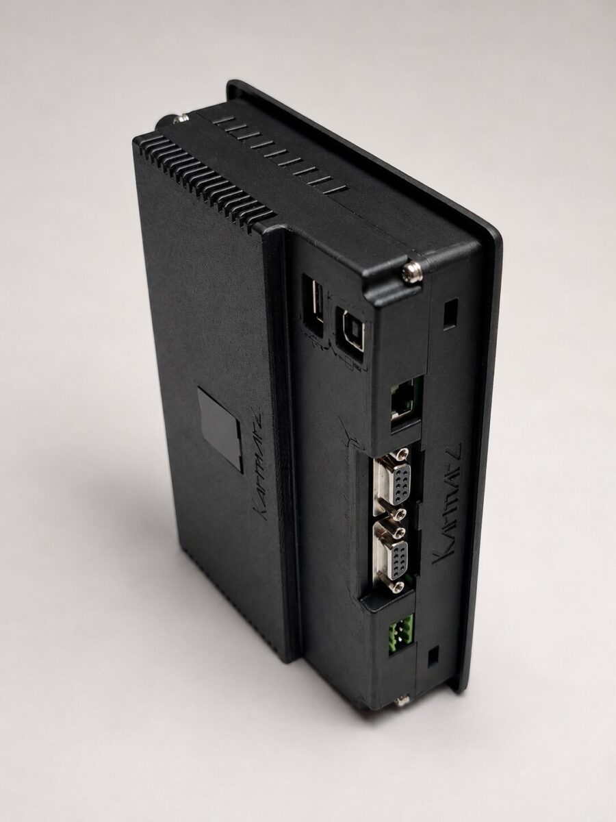 Canto de conectores: USB, Ethernet, los dos puertos serie y la alimentación